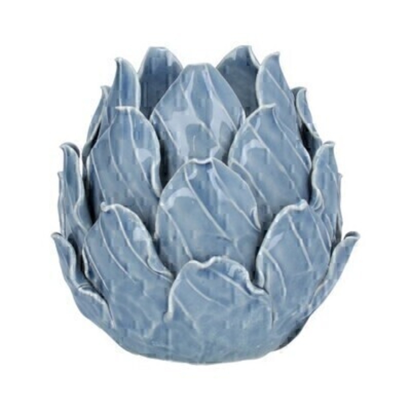This blue ceramic artichoke tea light candle holder is made by the London based designer Gisela Graham who designs really beautiful gifts for your home and garden. It is suitable for a standard size tlight candle. Would make an ideal gift. Also available in other colours.